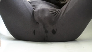 Horny Chick Masturbates and Squirts in her Yoga Pants
